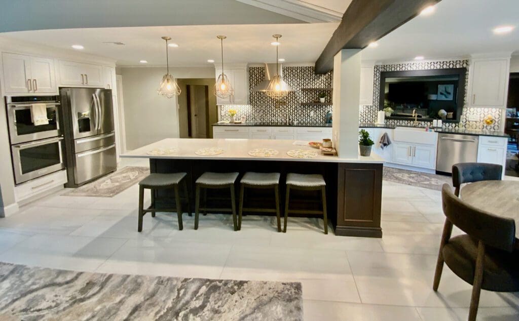 Custom Kitchen Cabinets featuring a dark-brown island and white base cabinets around the perimeter, designed in St. Louis, MO.